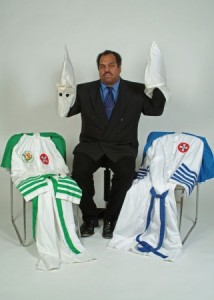 DD-With-Robes-Hoods-Given-to-Him-by-Klan-Members-321x450[1]